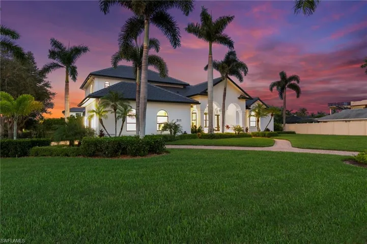 View of front of home with stucco siding