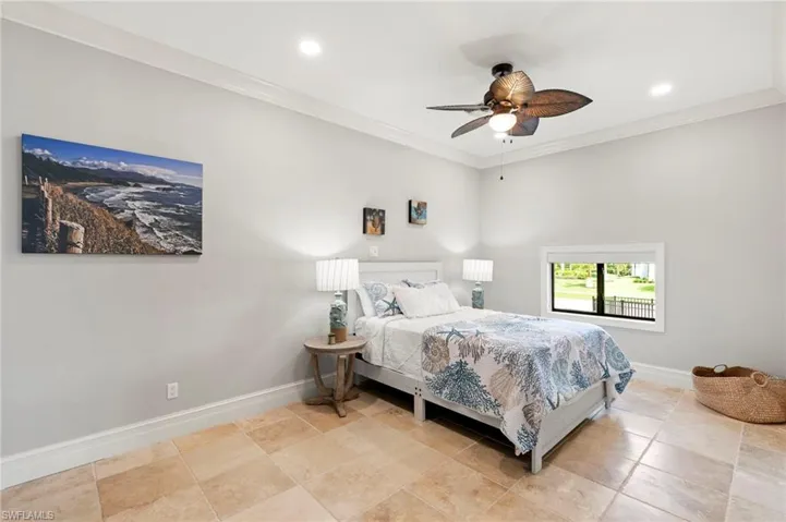 Bedroom with crown molding, ceiling fan, and recessed lighting