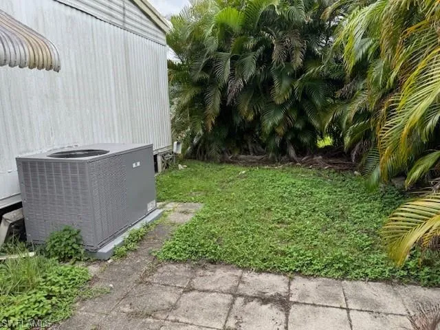 View of yard featuring central AC