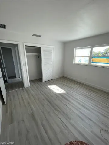 Guest bedroom with large double closet