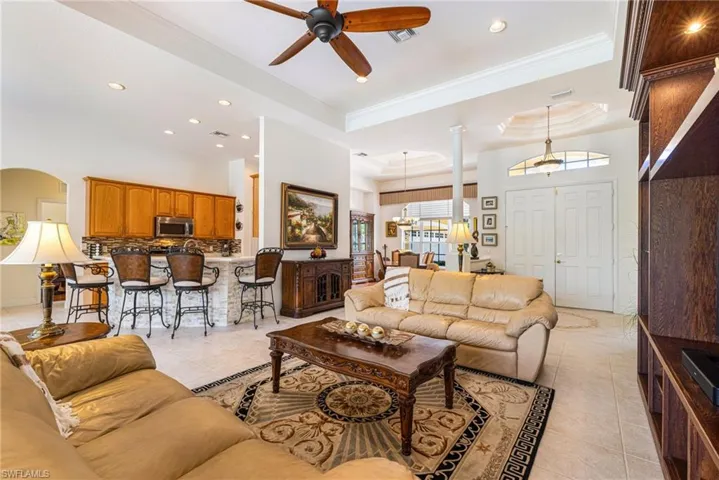 Living room with eat in kitchen bar