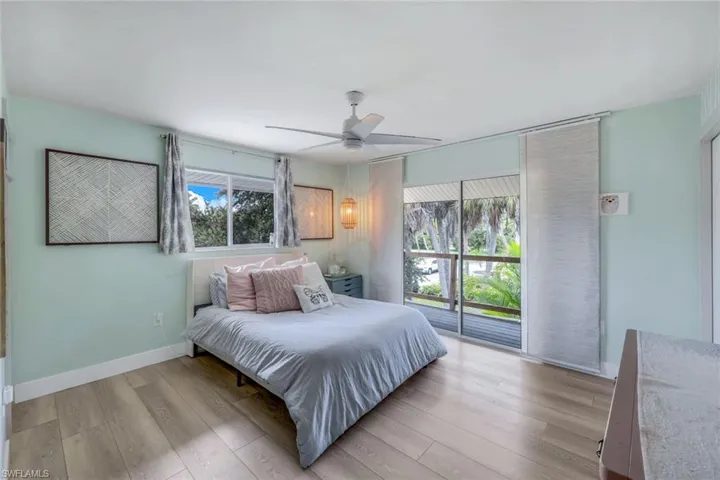 Large guest bedroom with access to the wrap-around porch.