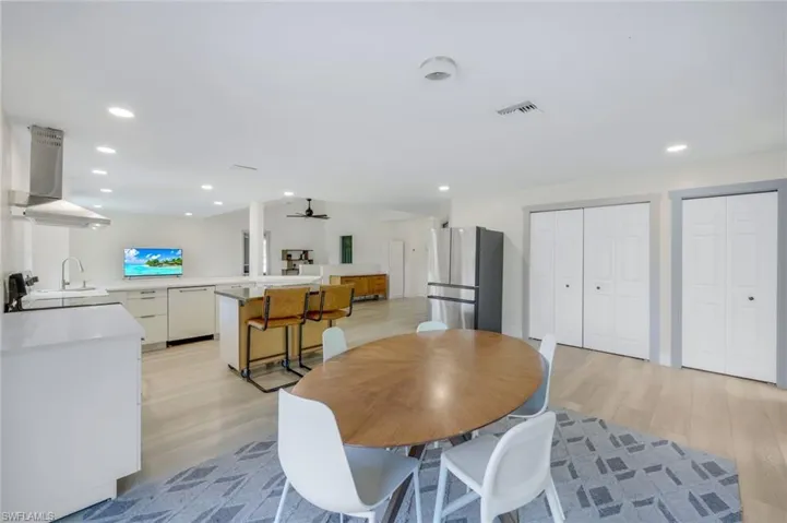 View of kitchen and living room from dining room.