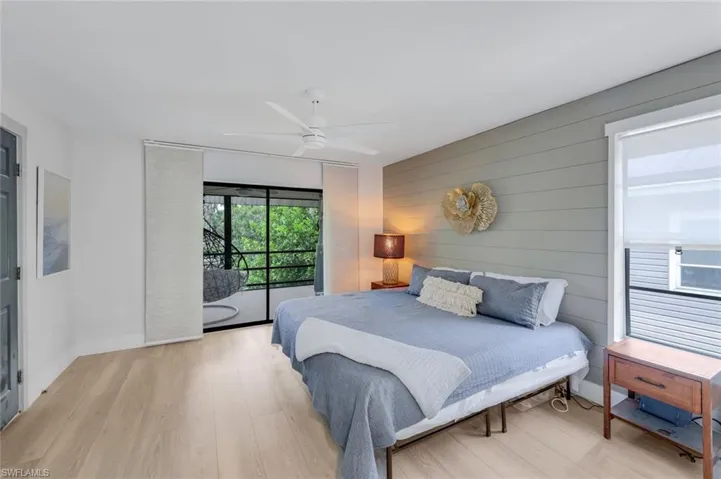 Primary suite offers a private lanai with gorgeous views of the Imperial River.