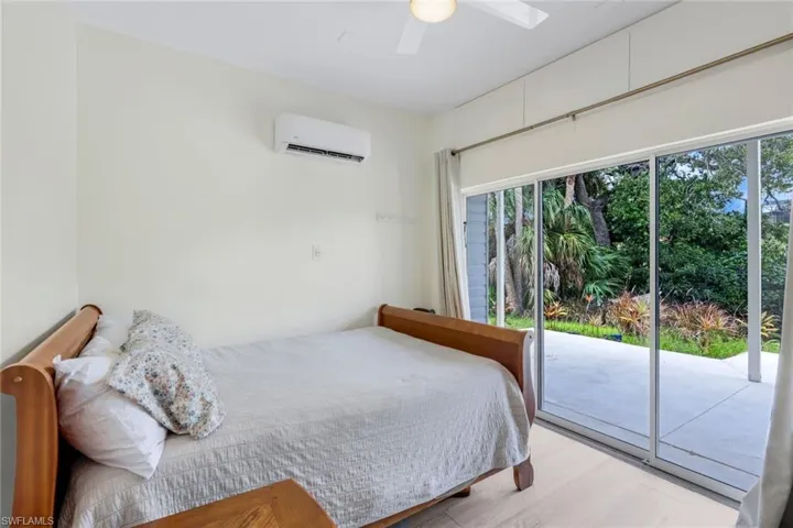 Den is located on the first floor with views of the river. Currently being utilized as a fourth bedroom.