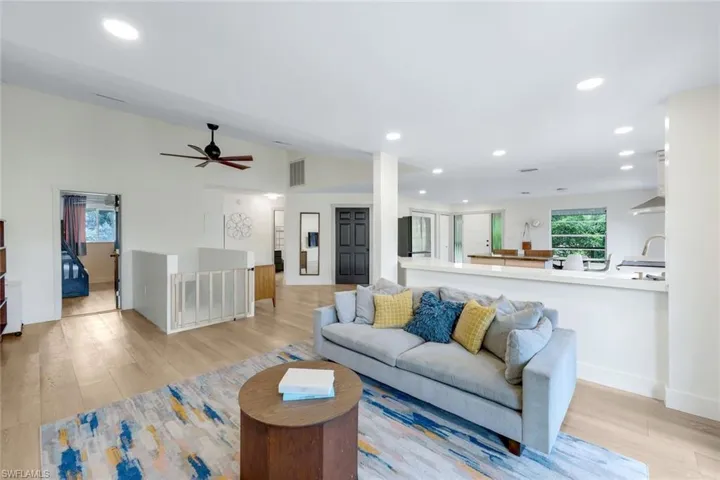 Living room, kitchen and dining room are open to one another.