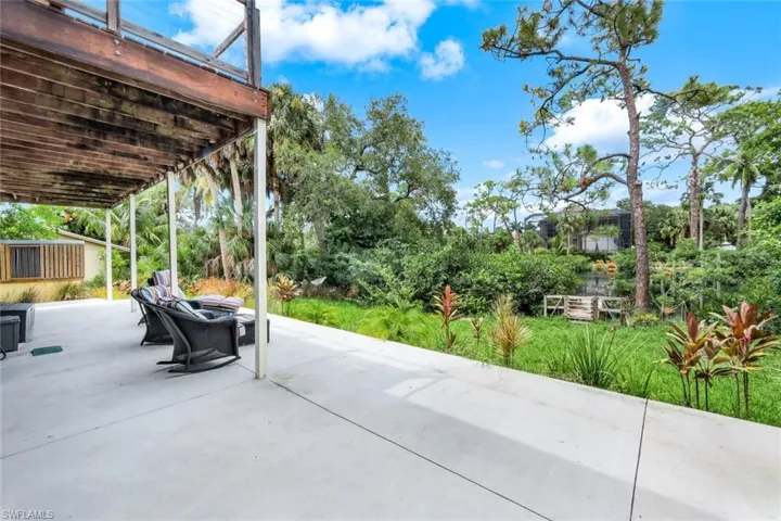Relax on your large patio after a long day at the beach.