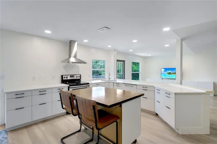 Plenty of room for two chefs in this kitchen! Kitchen also offers a walk-in pantry and dumb waiter.