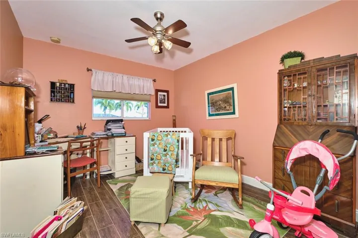 Bedroom #3 is a bit larger.  Seller has used as her office/nursery.  Room is slightly larger than the other two rooms.  All have a nice closet and window.