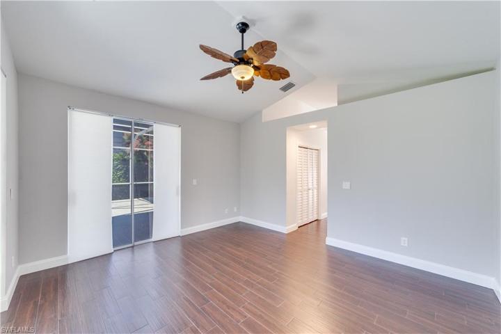Vaulted ceilings in the primary with ceiling fan, linen closet plus a walk in closet (not pictured).