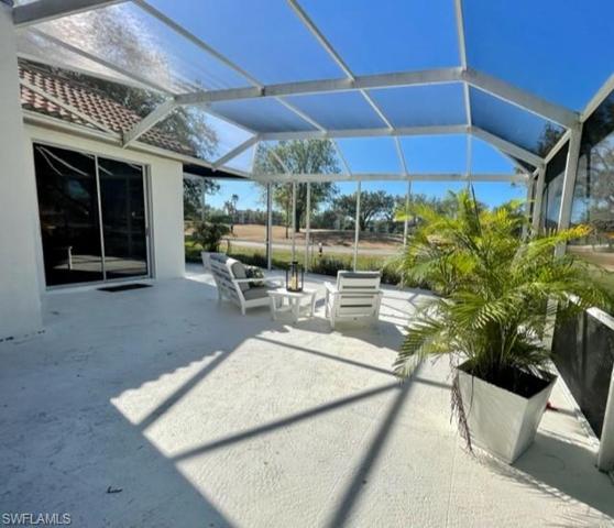 View from side screen door that leads into yard.