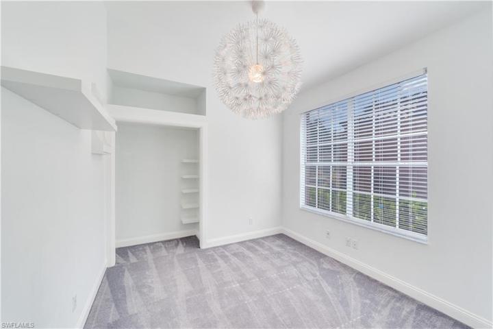 Bedroom or great office space with double door entry and builtins in the closet space.