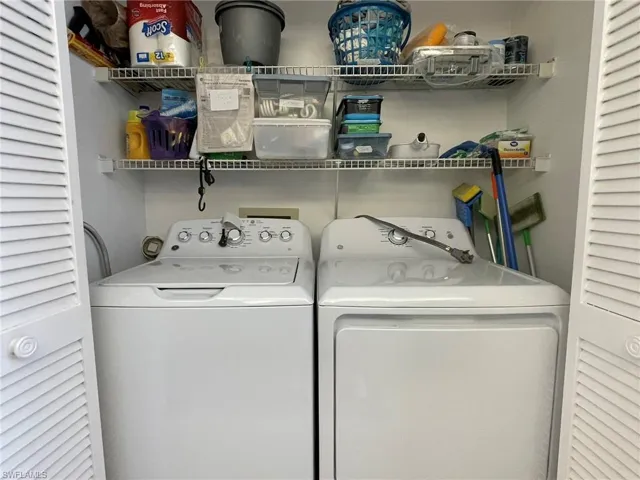 Laundry room with washer and dryer in the kitchen area