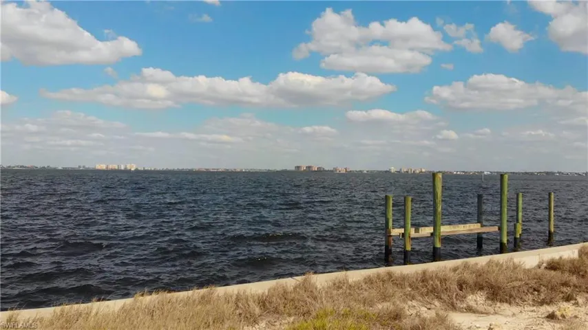 Dock featuring a water view