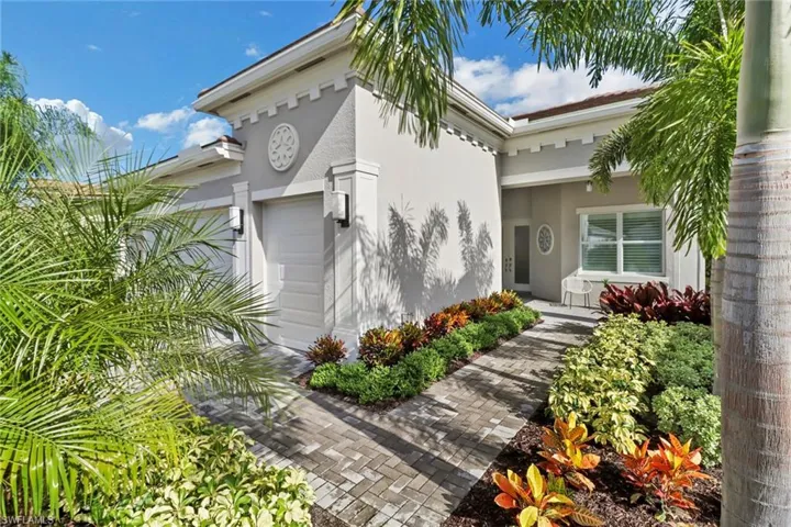 Entrance to property featuring a garage
