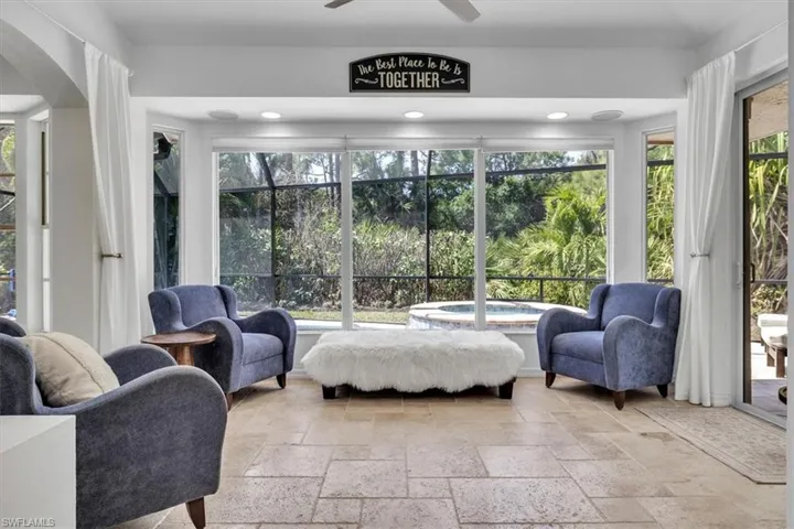 Sun Room overlooks Pool/Spa for your morning coffee!