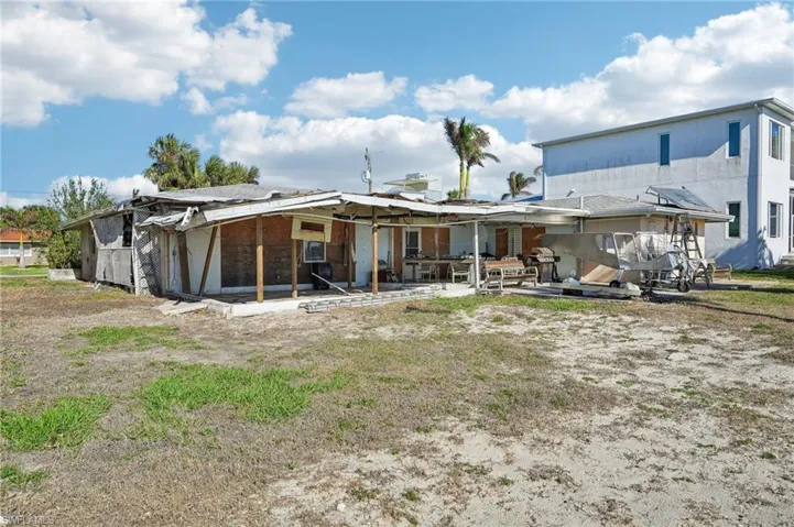 Rear view of house with a patio