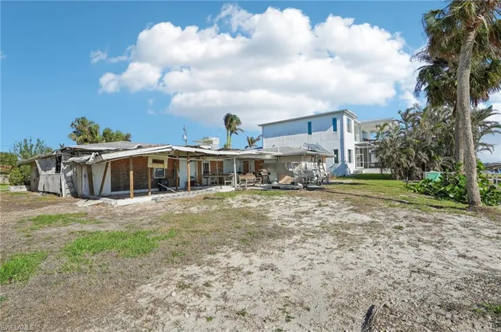 Rear view of property featuring a patio