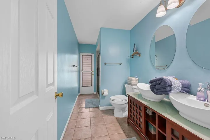 Guest bathroom with pool access as well.