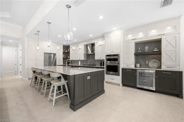 Expanded kitchen upgrade with optional upper cabinets, dry bar and upgraded appliances