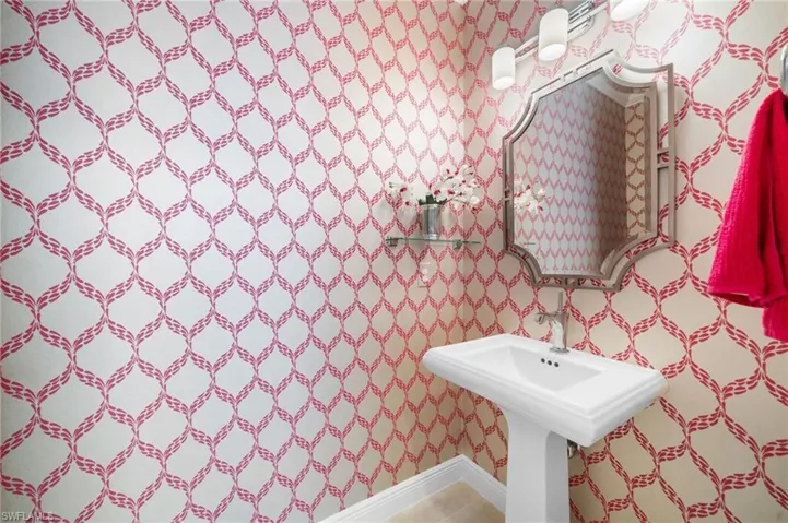 Powder bathroom with custom wallpaper