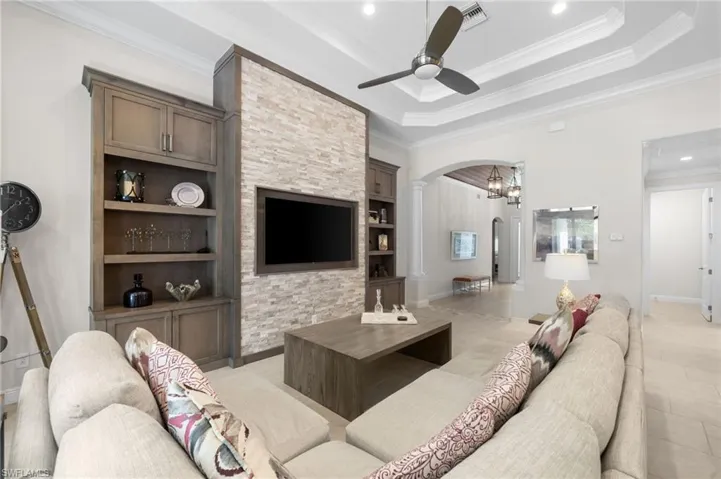 Double tray ceiling and stone accented wall