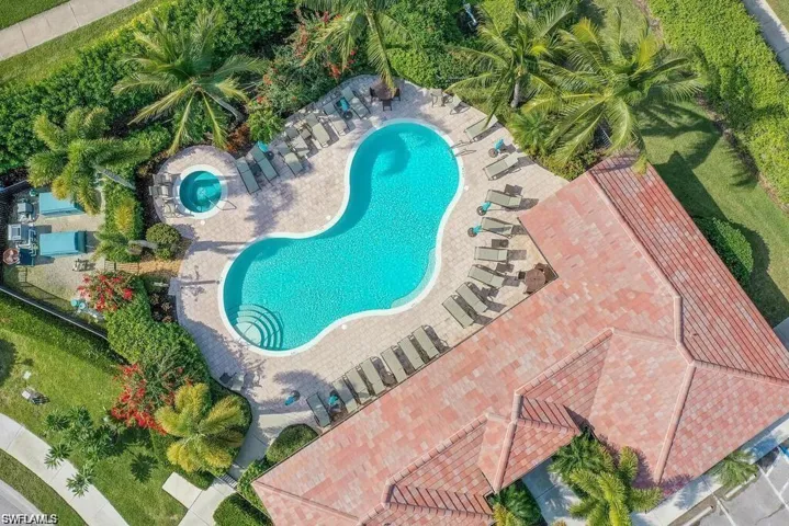 Community pool featuring a patio area