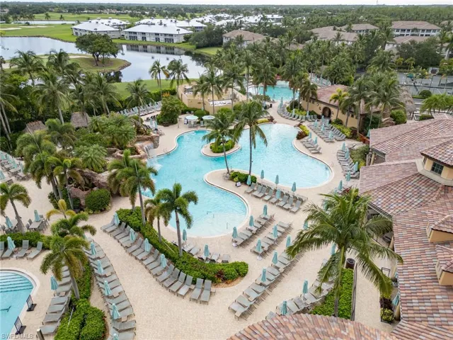 Community pool with a water view
