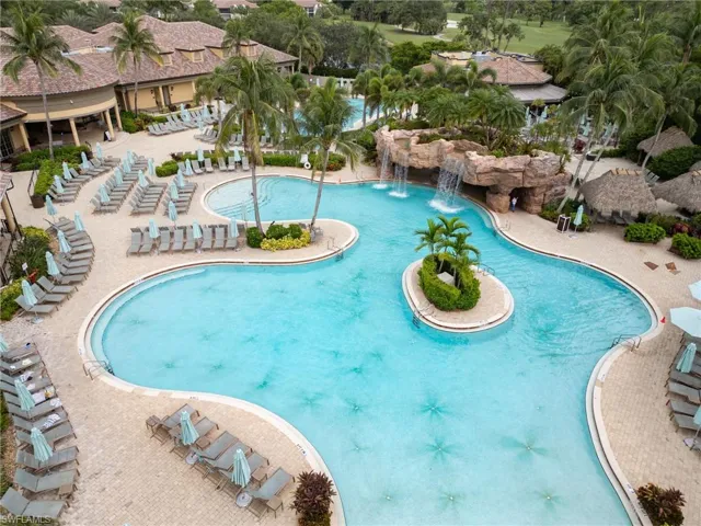 Community pool featuring a patio
