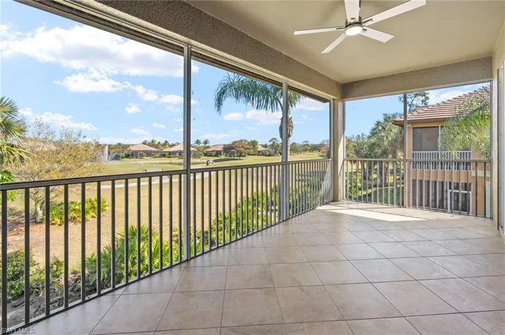 Unfurnished sunroom featuring a residential view