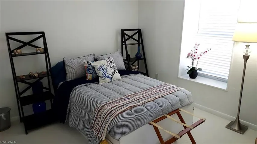 Bedroom featuring baseboards