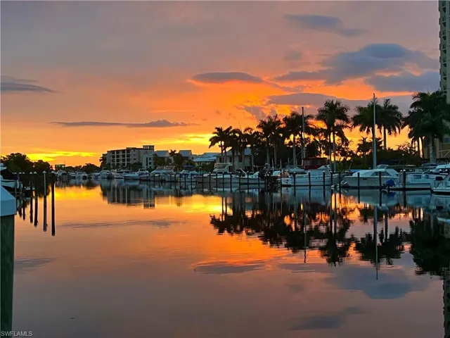Water view with a boat dock