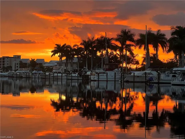 Water view featuring a dock