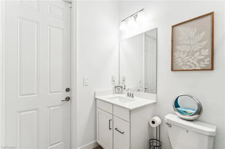 Bathroom with vanity and toilet