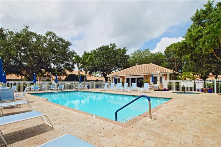 Pool with clubhouse in background