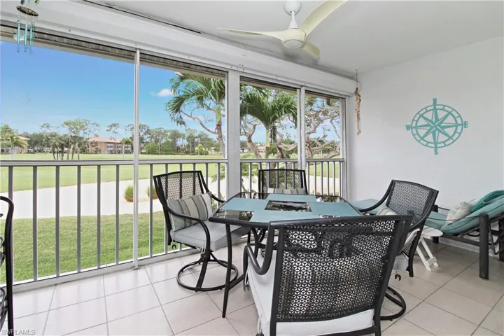 Tiled lanai, electic storm shutters and fan