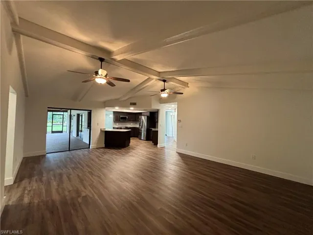 living room with vaulted ceiling