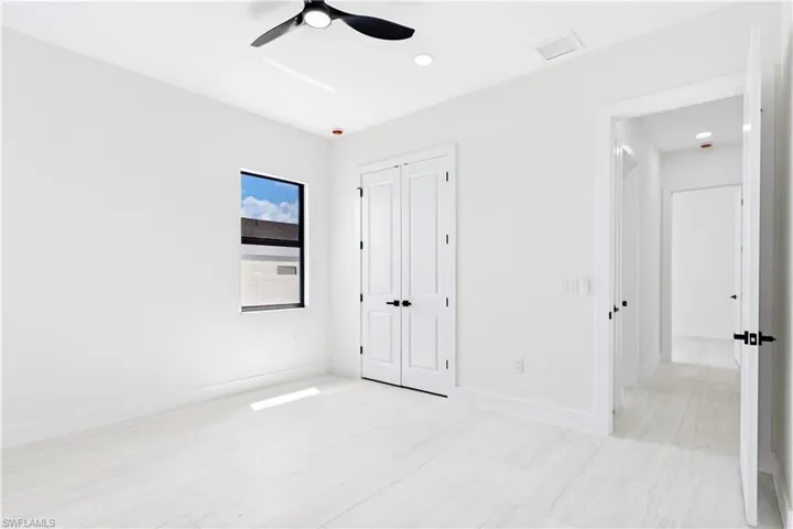 SPLIT LAYOUT w/ SECOND PRIMARY SUITE w/ POOL BATHROOM & TWO GUEST BEDROOMS w/ HALL BATHROOM for added privacy.
