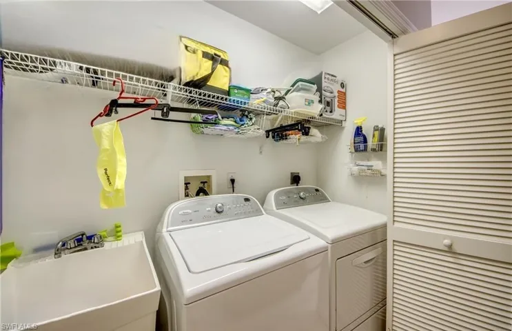 Clothes washing area with a sink