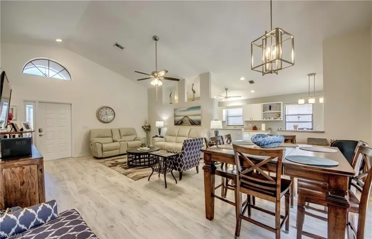 Beautiful beachy colored floor tiles carry through the home