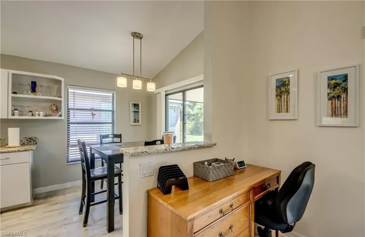 The large open great room with dining and living area can have a nook for your desk as pictured.