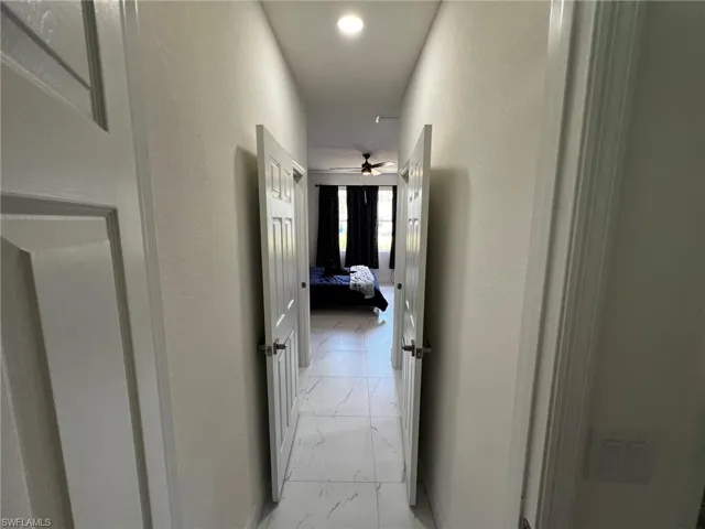 Hall with marble finish floor