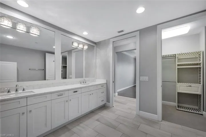 Floors are ALL white marble in every room. Photo of a similar unit to show layout