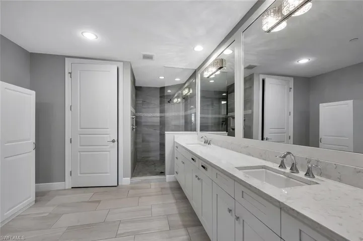 Floors are ALL white marble in every room. Photo of a similar unit to show layout