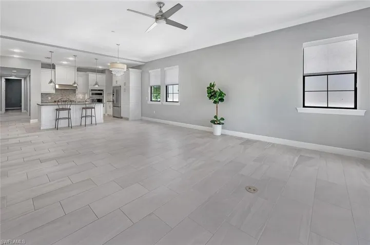 Floors are ALL white marble in every room. Photo of a similar unit to show layout