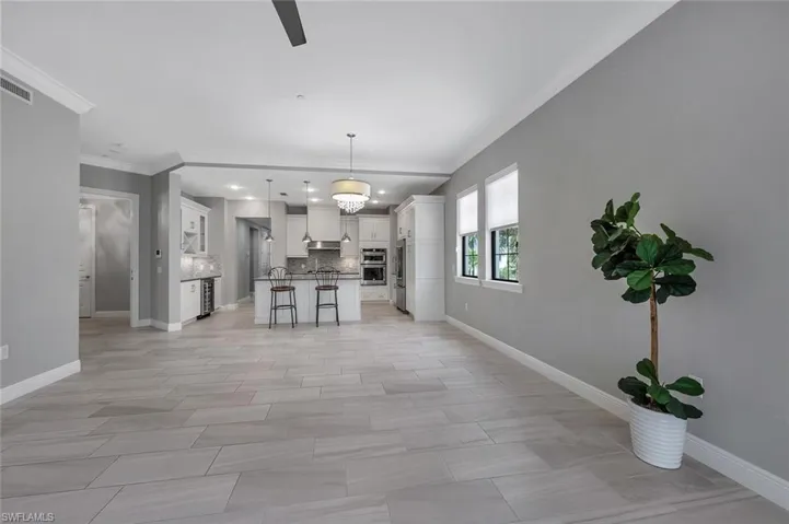 Floors are ALL white marble in every room. Photo of a similar unit to show layout