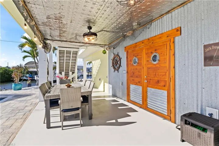 From dawn to dusk, enjoy this rambling outdoor living area all season long.