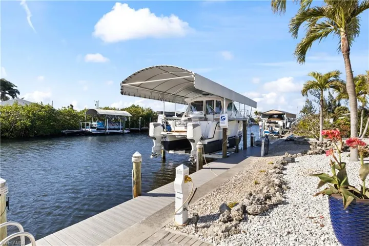 Prepare to be captivated by this majestic gulf access riverfront home.