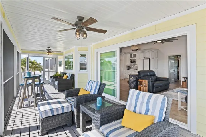 The seamless transition from indoor to outdoor living enhances the home’s spacious feel and provides the perfect setting for relaxation or entertaining.