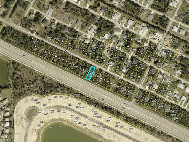 Fronts on Meadow Rd. Back of the lot on SR 82